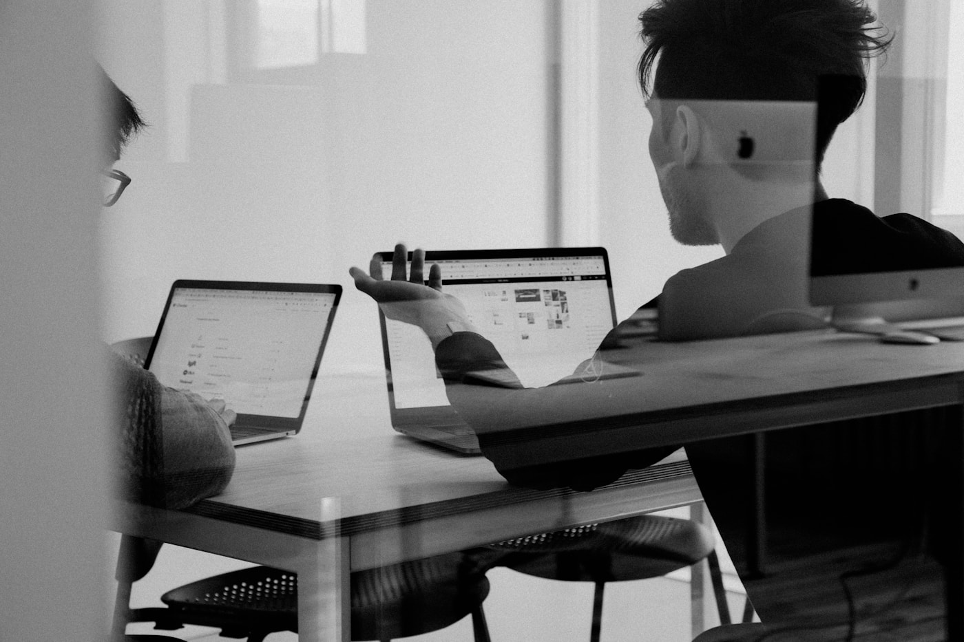 Brand positioning session with strategy materials on table